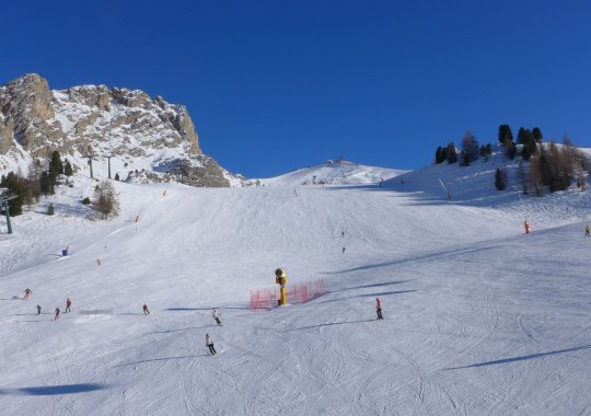 Pista rossa veloce che attraversa il Belvedere di Canazei